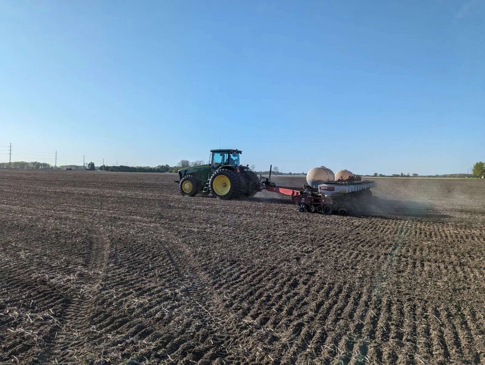 Liquid QLF fertilizer being applied while planting on a Shepherd-area farm
